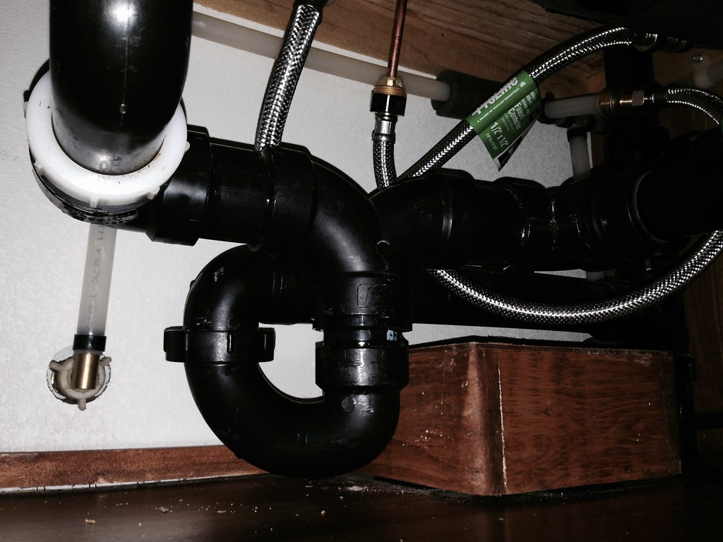 Under sink plumbing. Water supply lines need to be convert… Flickr