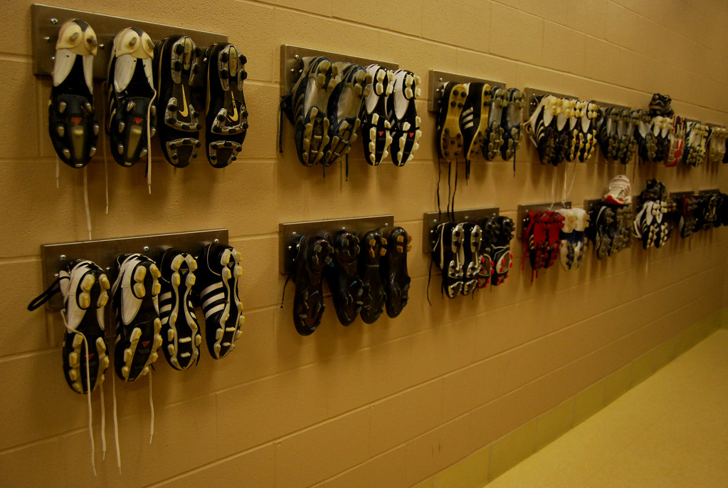 Soccer cleats Cleats hang on the wall in the "kit room" at… Flickr