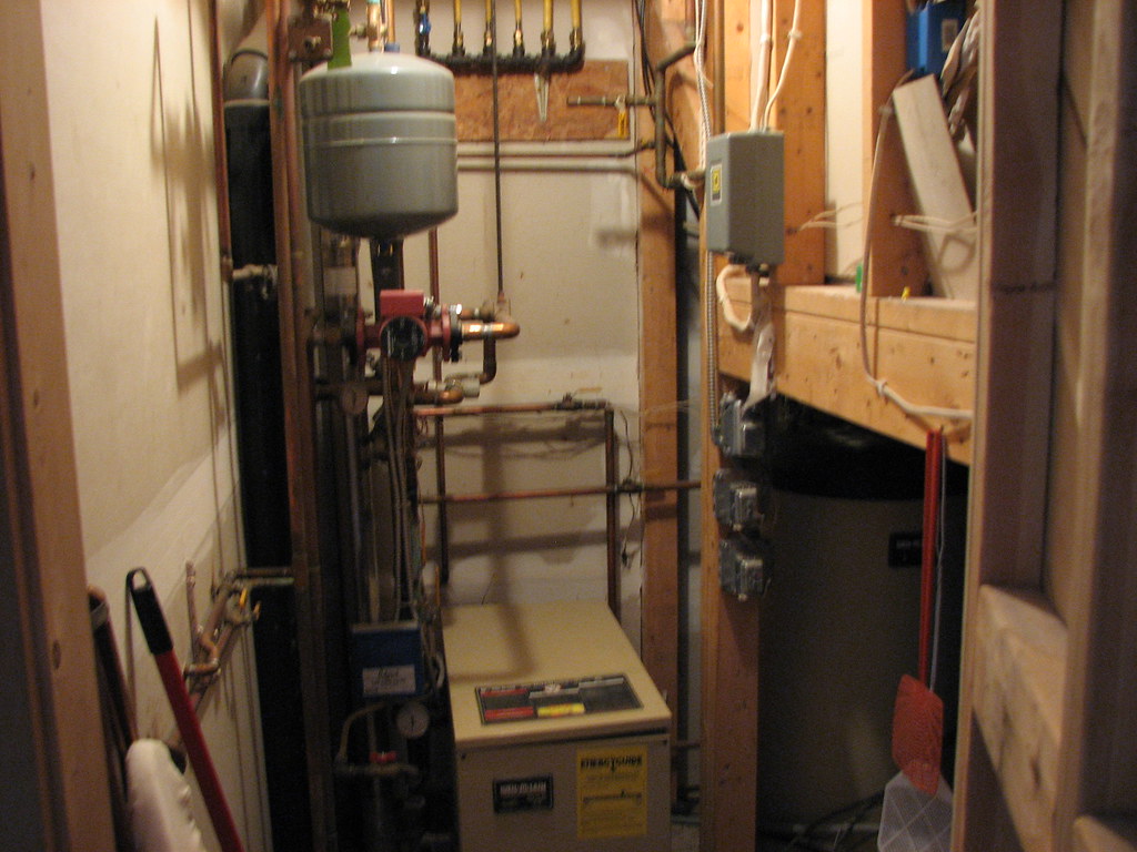 Furnace Furnace room and water heater under stairs to loft… michael
