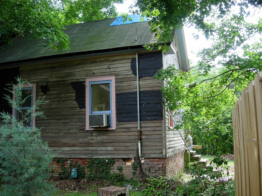 The asbestos siding comes off and the house starts to come… Flickr