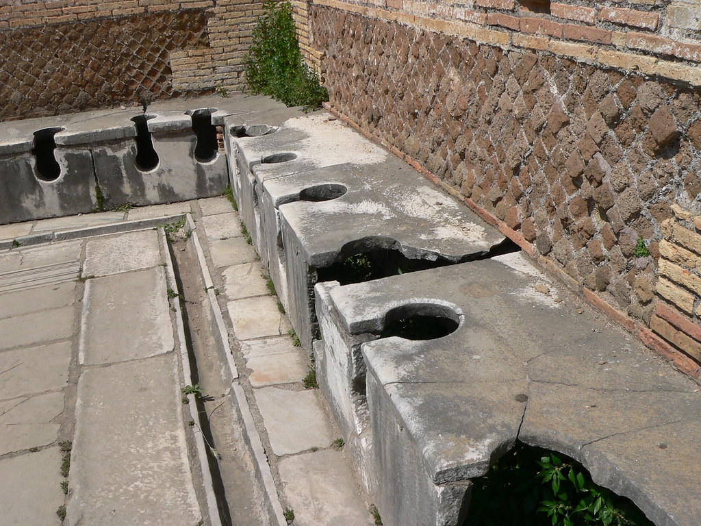 latrines at Ostia Antica Beats Italian squat toilets... Flickr