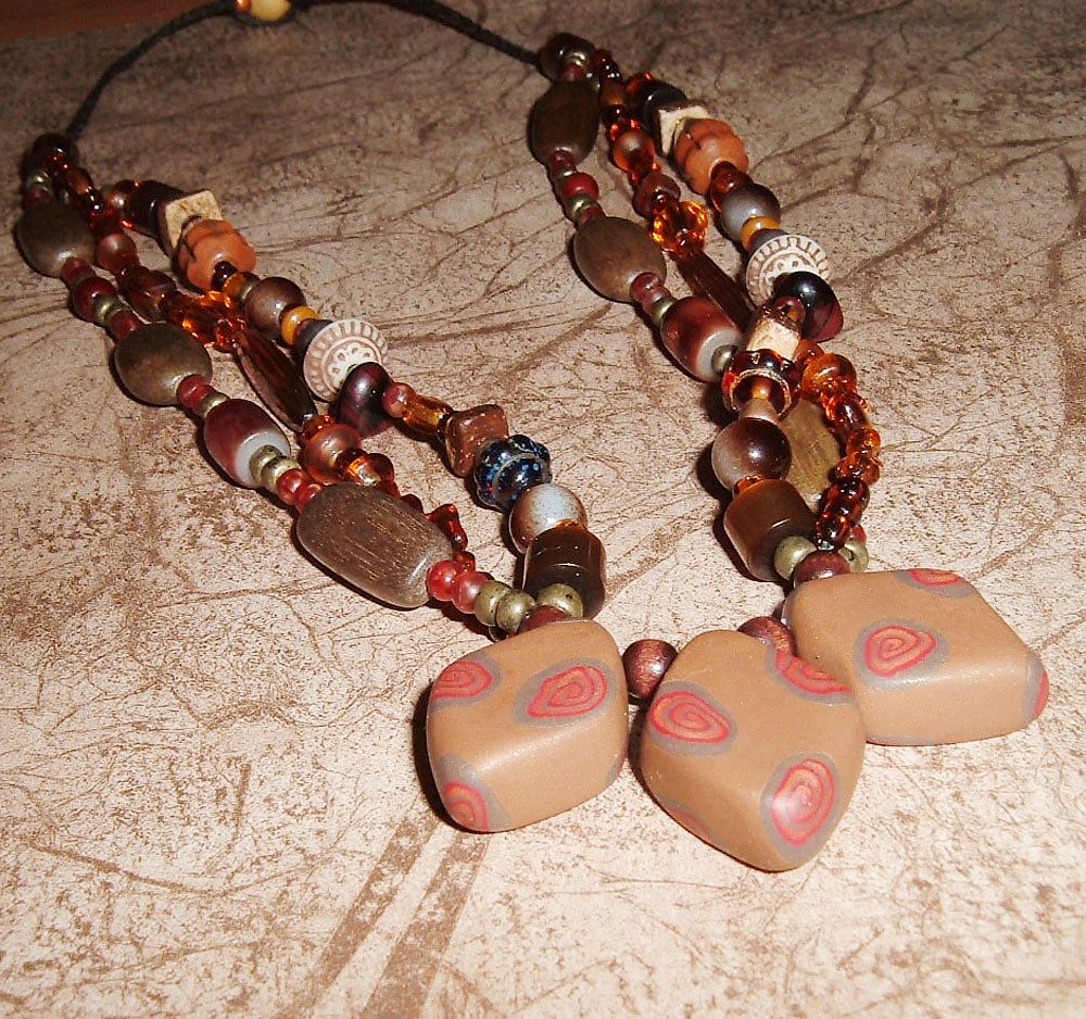Browns necklace Three polymer clay beads with simple spira… Flickr