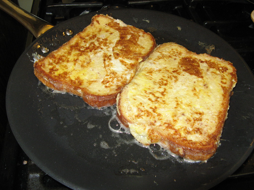 My French Toast . . . The French toasts on the pan . . . Flickr