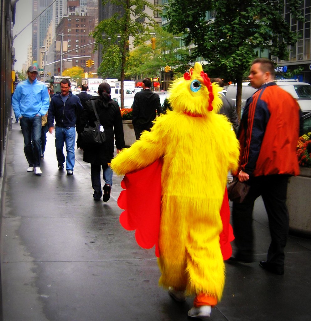 25 October 2007 a guy in a chicken suit sure does cheer th… Flickr