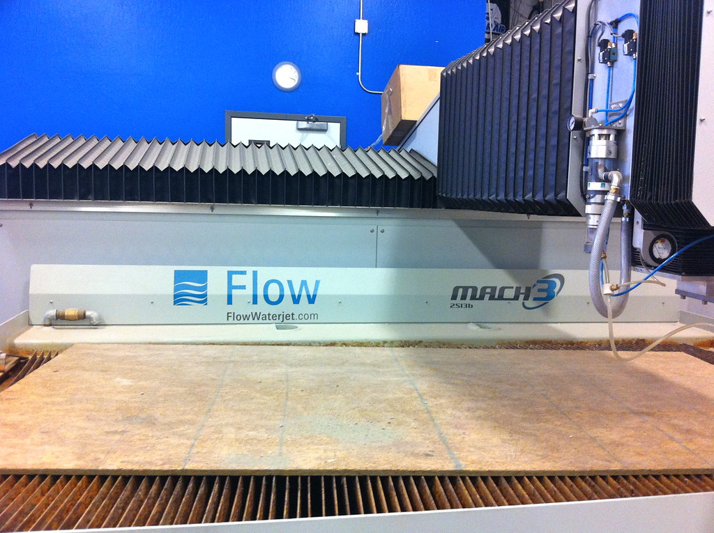 flow water jet cutter apparently can cut through 12 inches… Flickr