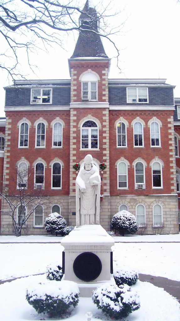 St. Ambrose in the snow statue of Saint Ambrose, of… Flickr