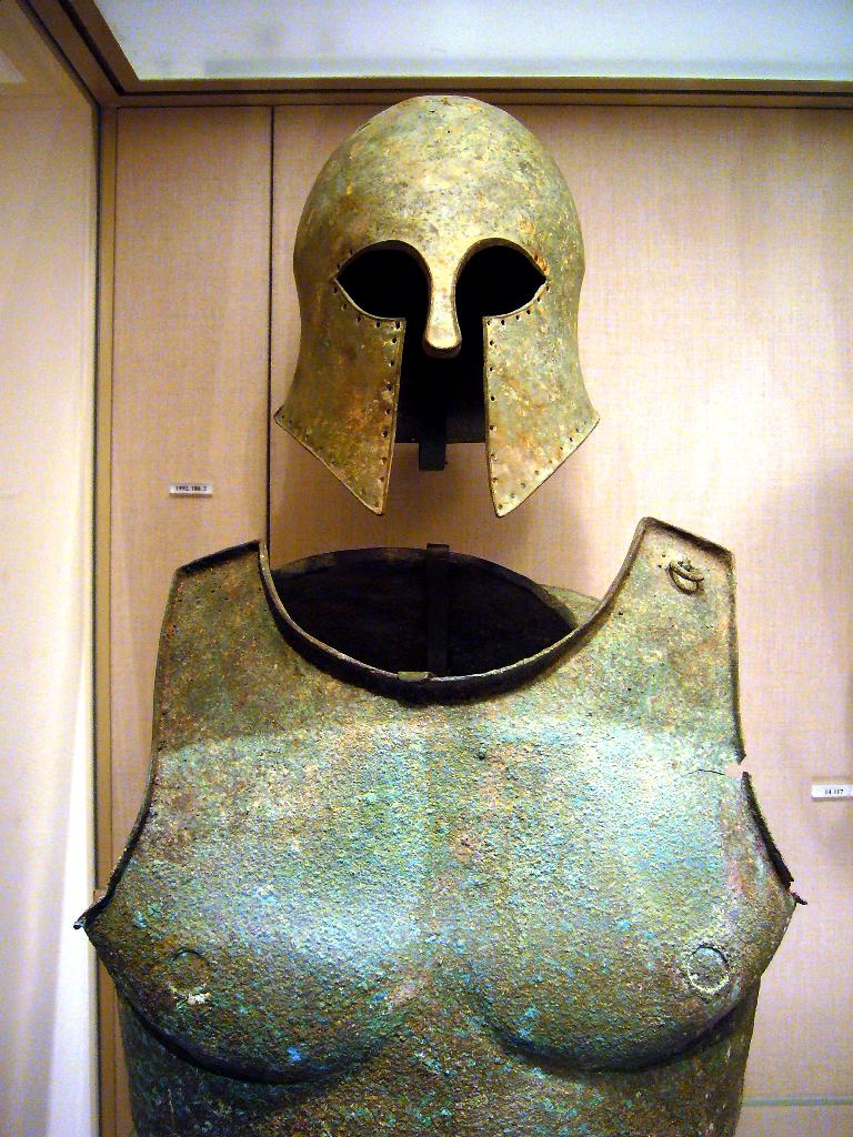 Ancient Greek bronze armor (helmet of Corinthian type and muscled