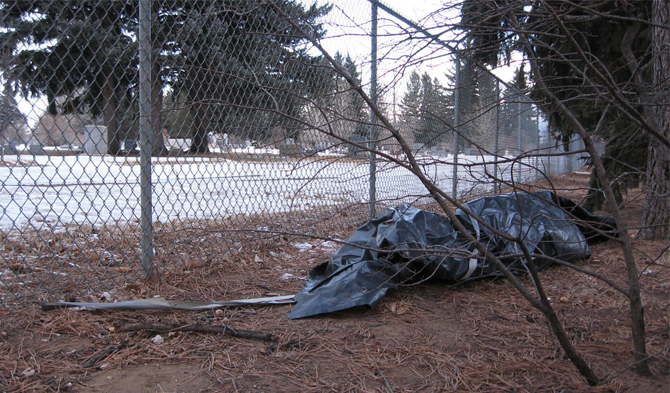 tarp/bodybag Leaving bunched up tarps near a cemetery is a… Flickr
