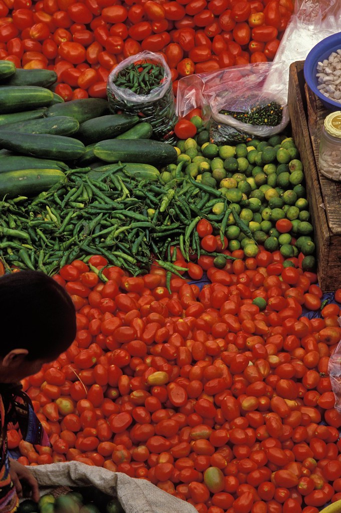 Buying fresh produce Buying fresh food at the market. Phot… Flickr