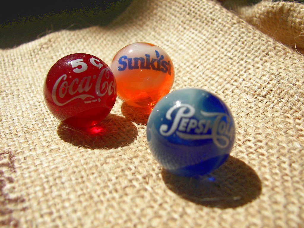Soda Marbles Coke, Pepsi, and Sunkist marbles basking in t… Flickr