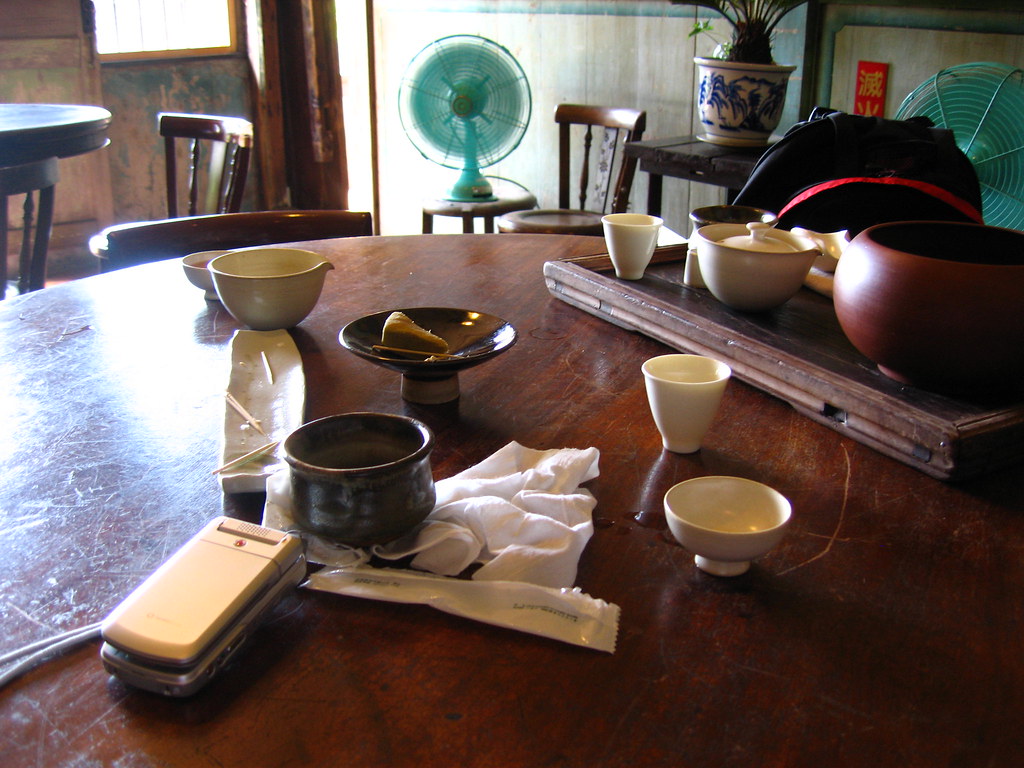 Jioufen Tea House Tea cup, sweets and mobile phone Hiro Flickr