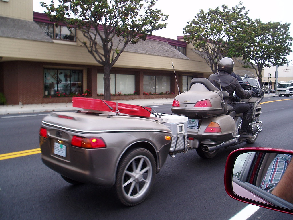 Trailer I always think it is funny to see a motorcycle tow… Flickr