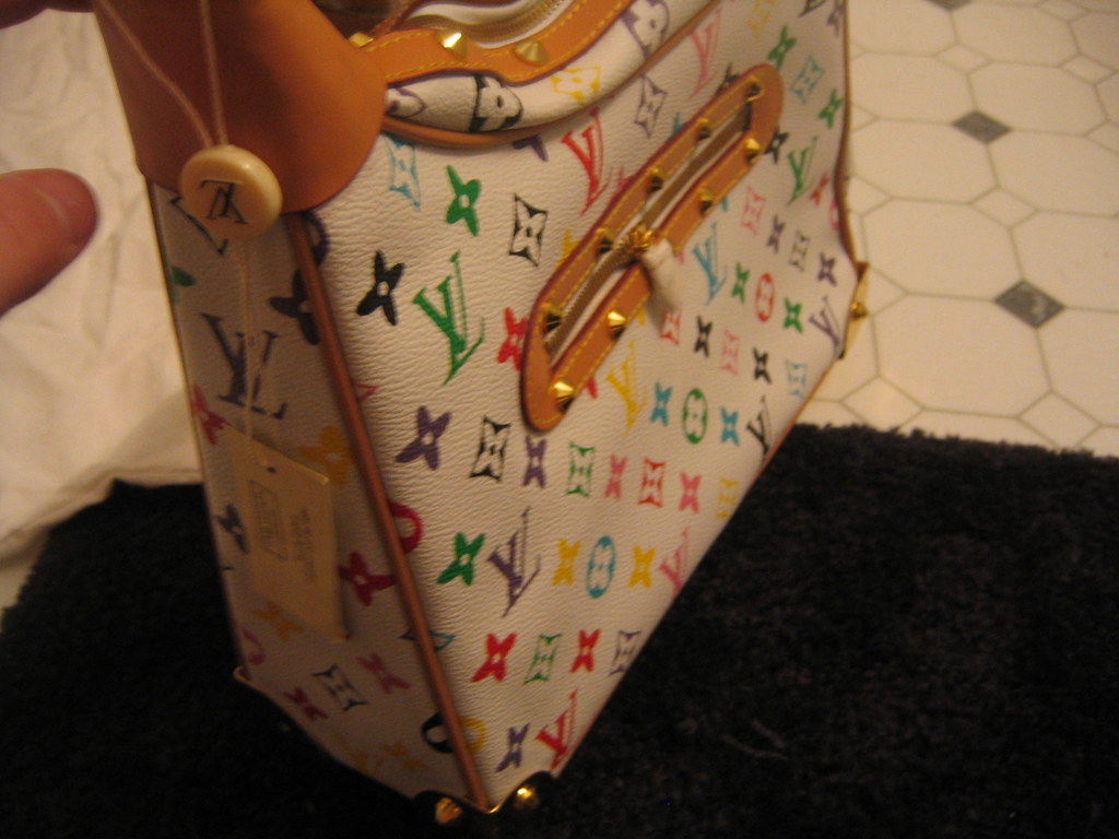 A Designer LIE (Bad Fake, Damaged Goods) Sam's birthday pr… Flickr