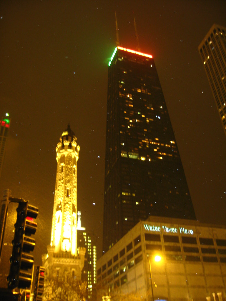 John Hancock Walking along Michigan Avenue in the snow. De… Flickr