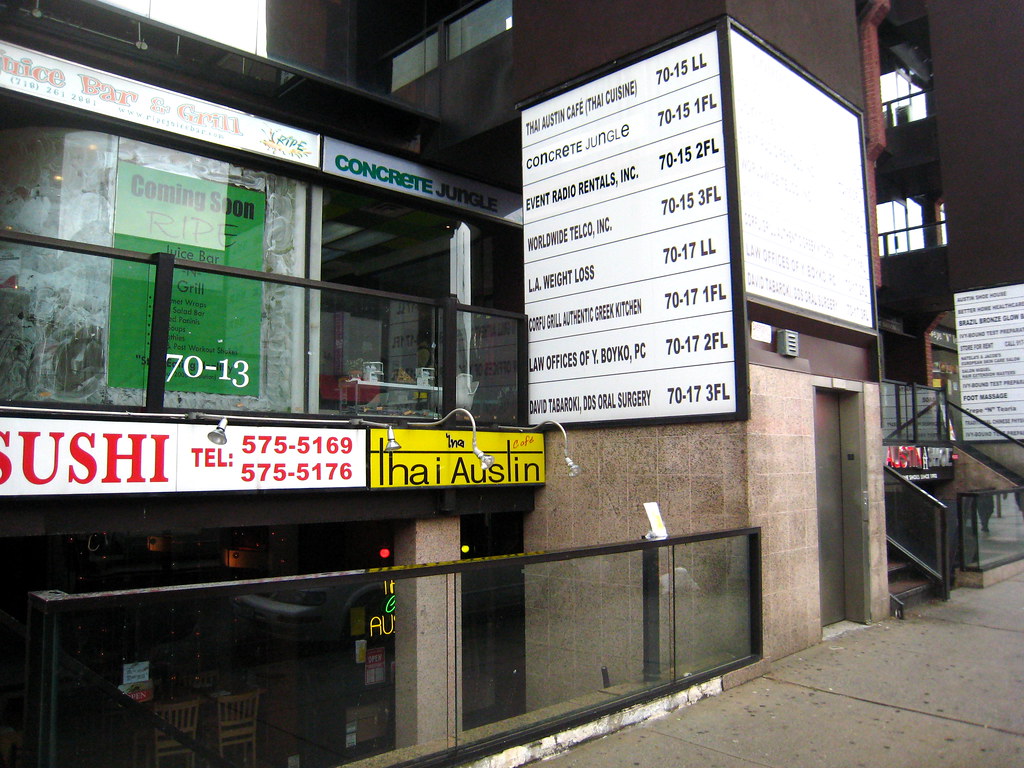 Austin Street, Forest Hills Stores just above street level… Flickr