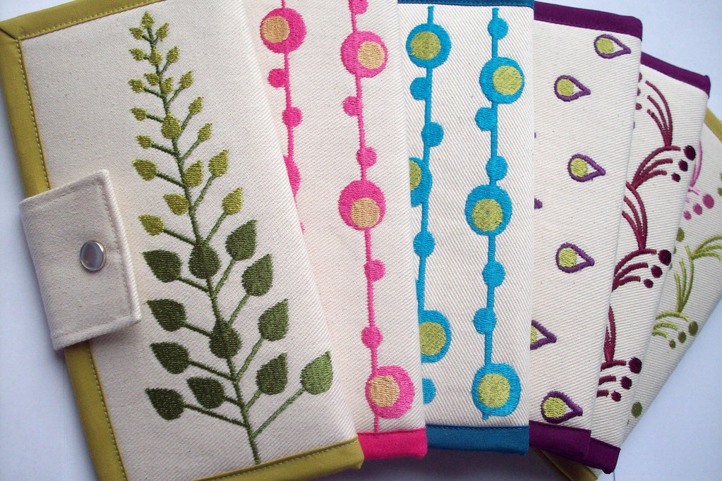 Embroidered Wallets These are a my original embroidery des… Flickr