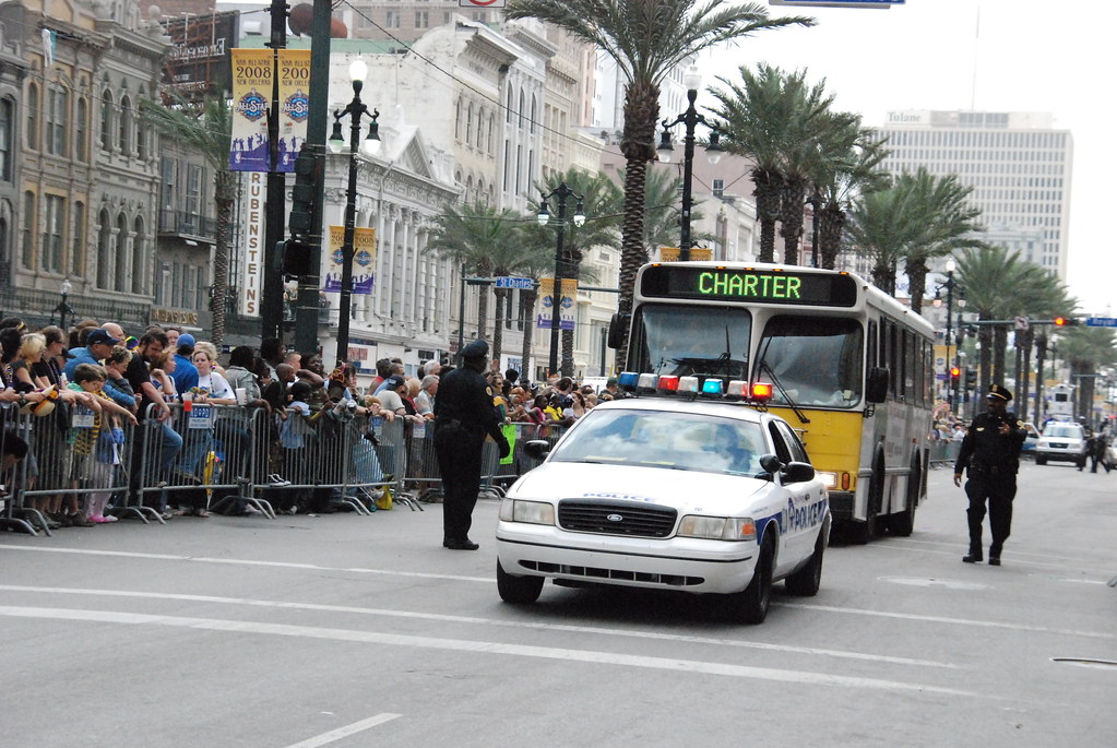 MardiGras0697 A police escort for an empty charter bus ah… Flickr