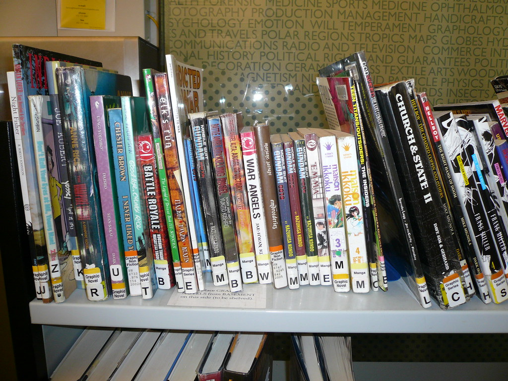 Manga, manga, manga... The graphic novel reshelving cart. … Flickr