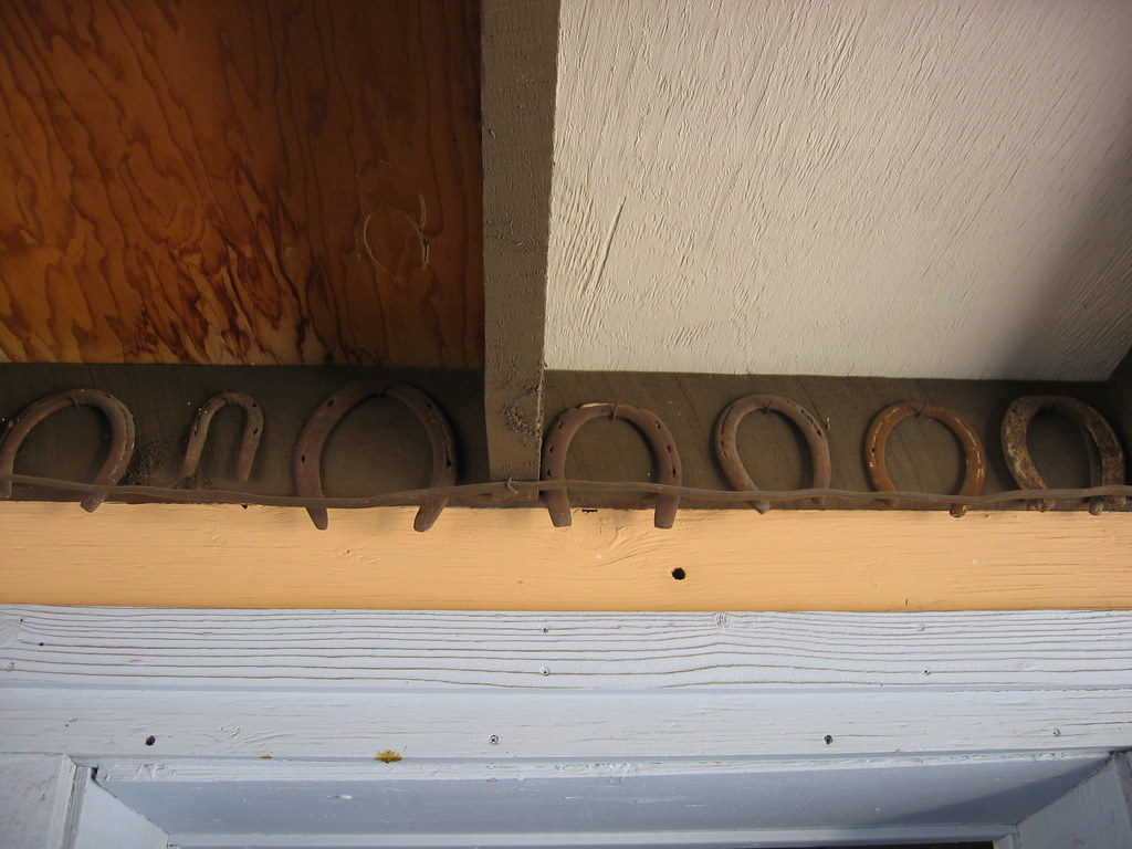 Line of horseshoes Just some horseshoes above the door in