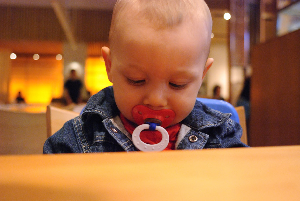 Restaurant Baby Sitting up nicely in a strapin *booster c… Flickr