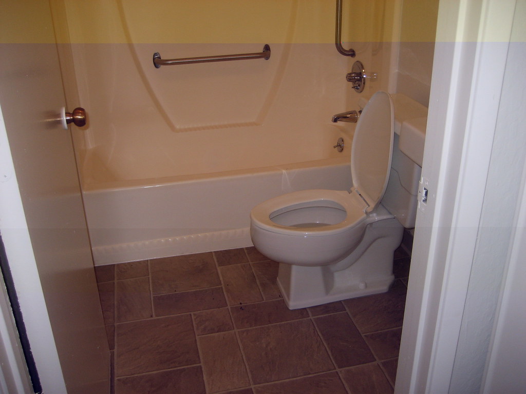 bathroom LOOKS LIKE PLACE FOR LADY'S LITER PAN & TRASH CAN… Flickr