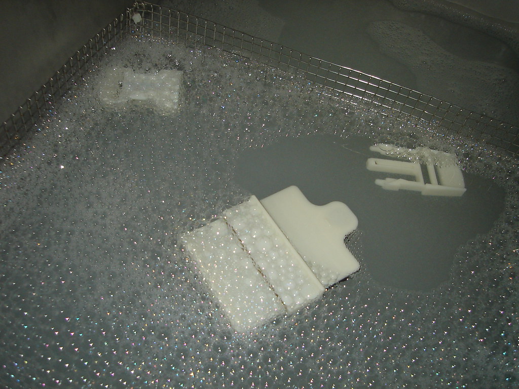 Water with sodium hydroxide to dissolve soluble support ma… Flickr