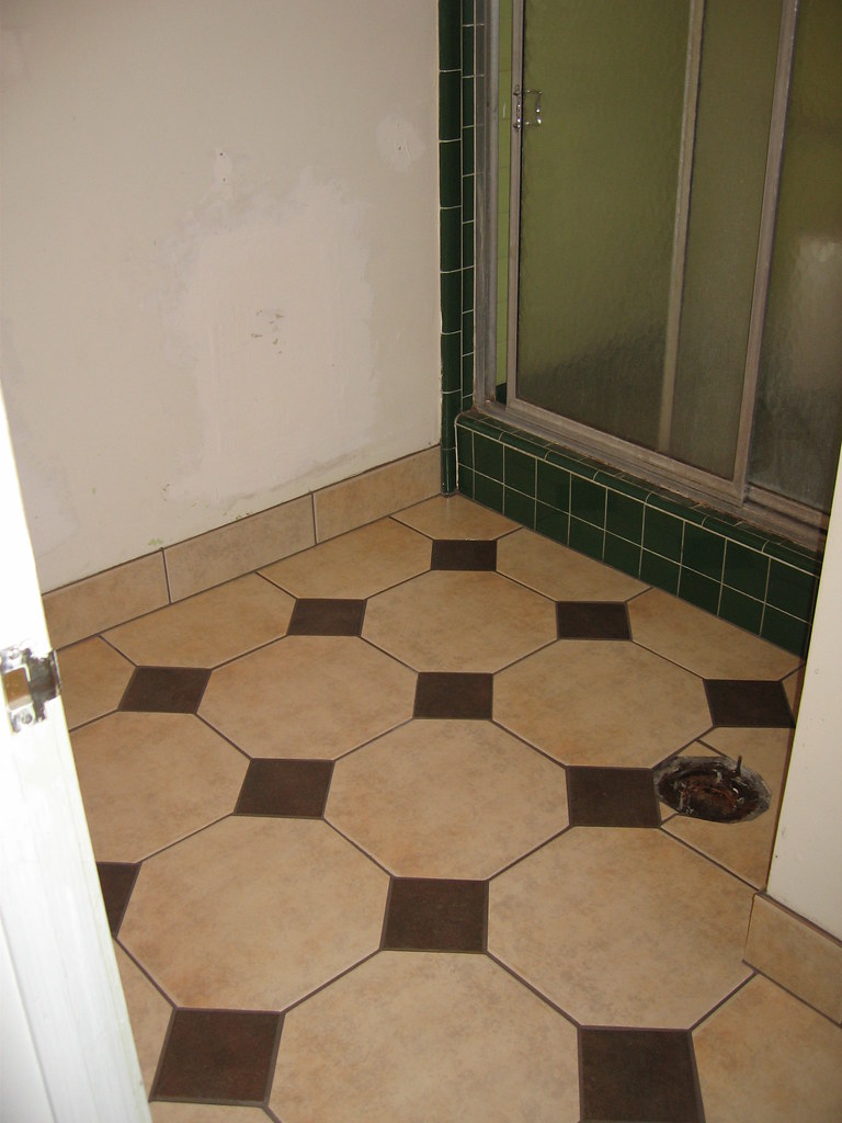 Baseboard grout shower Epoxy grout in place on