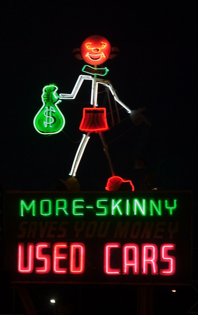 More Skinny Used Cars, Pueblo, CO I love moving neon signs… Flickr