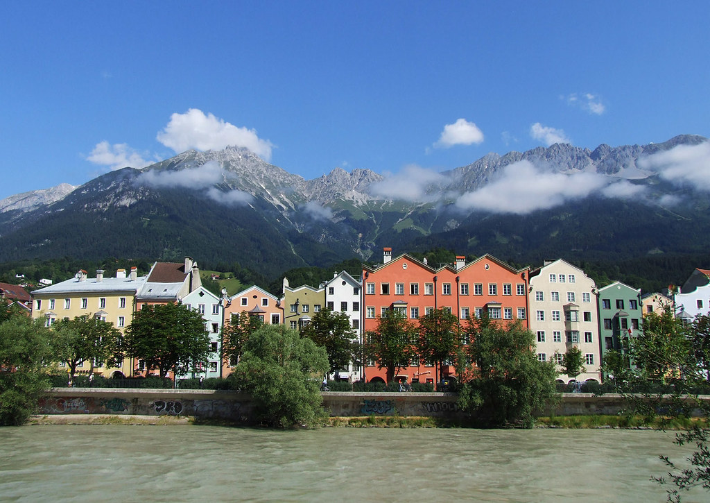 Innsbruck, Austria Cute pastel homes along the River Inn w… Flickr