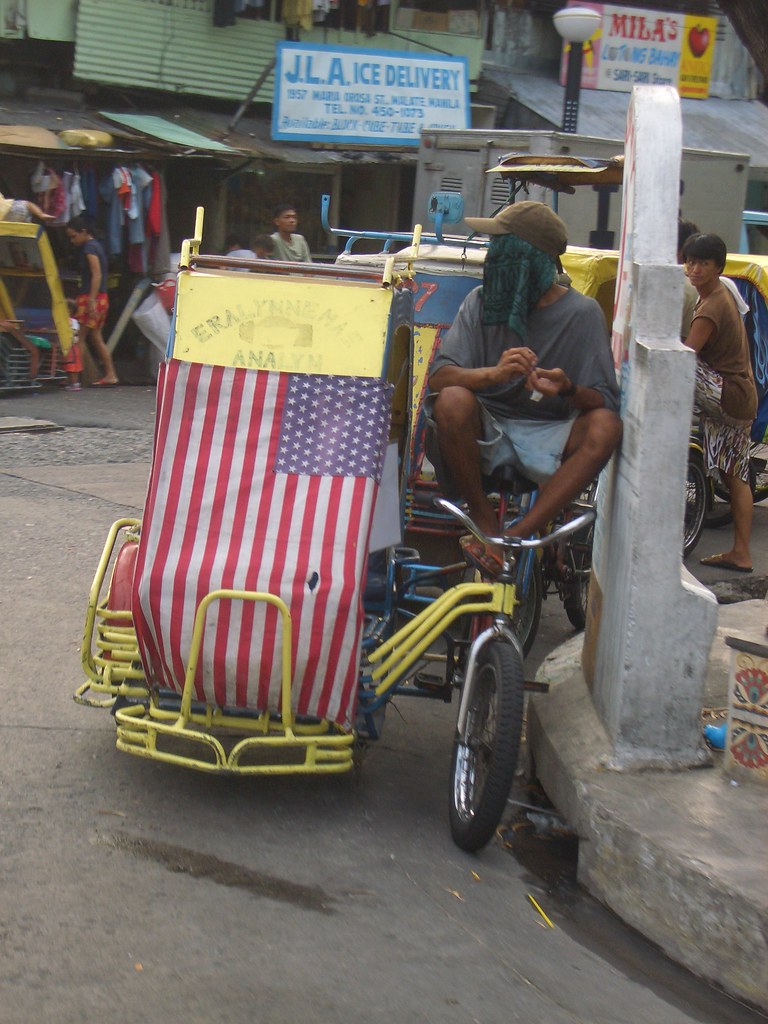 Filipino tricycle with an American flag perhaps his dr… Flickr