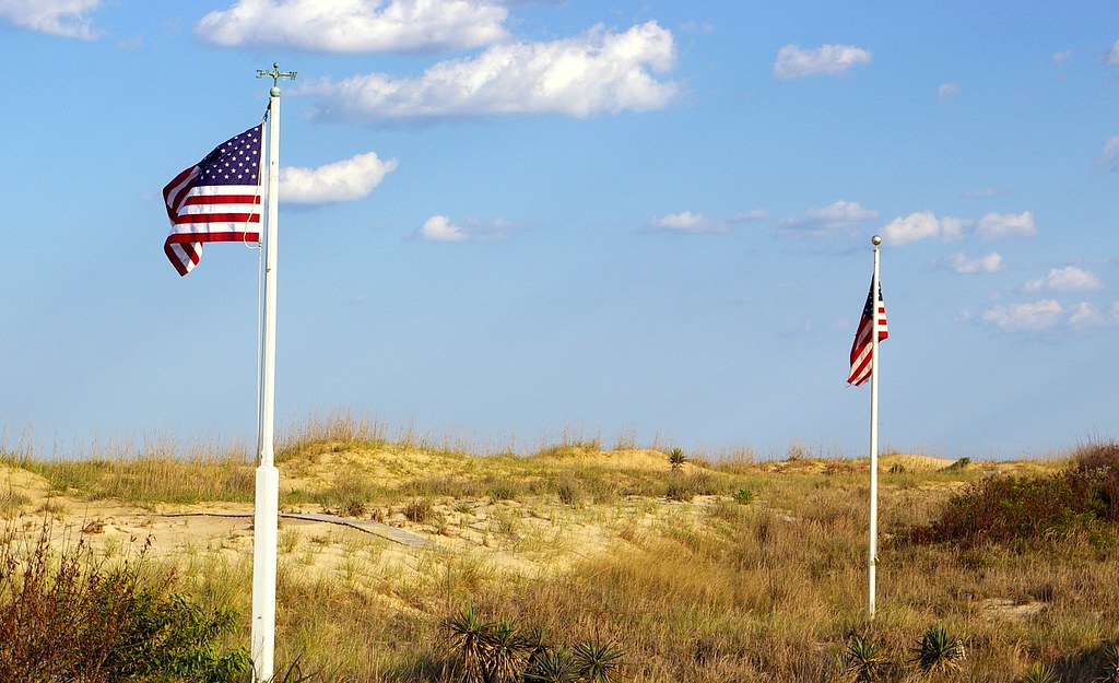 Pair of Flags on the Sand Dunes L. Allen Brewer Flickr