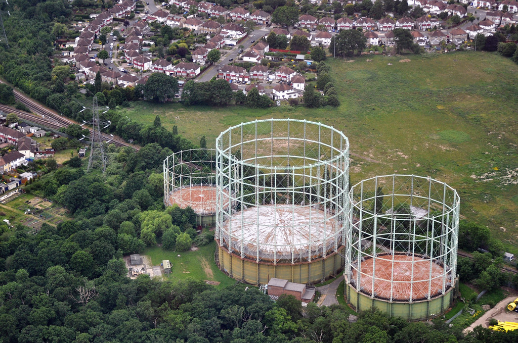 Gas Holders Gas holders and pylon, Motspur Park. John King Flickr