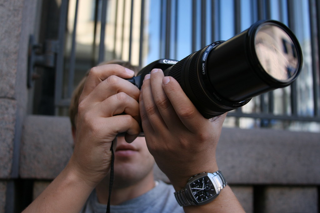 Ted Ted holding his new camera (canon 450D), with Thore's … Flickr