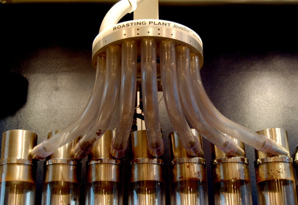 Pneumatic tubes bring just roasted coffee beans into their… Flickr