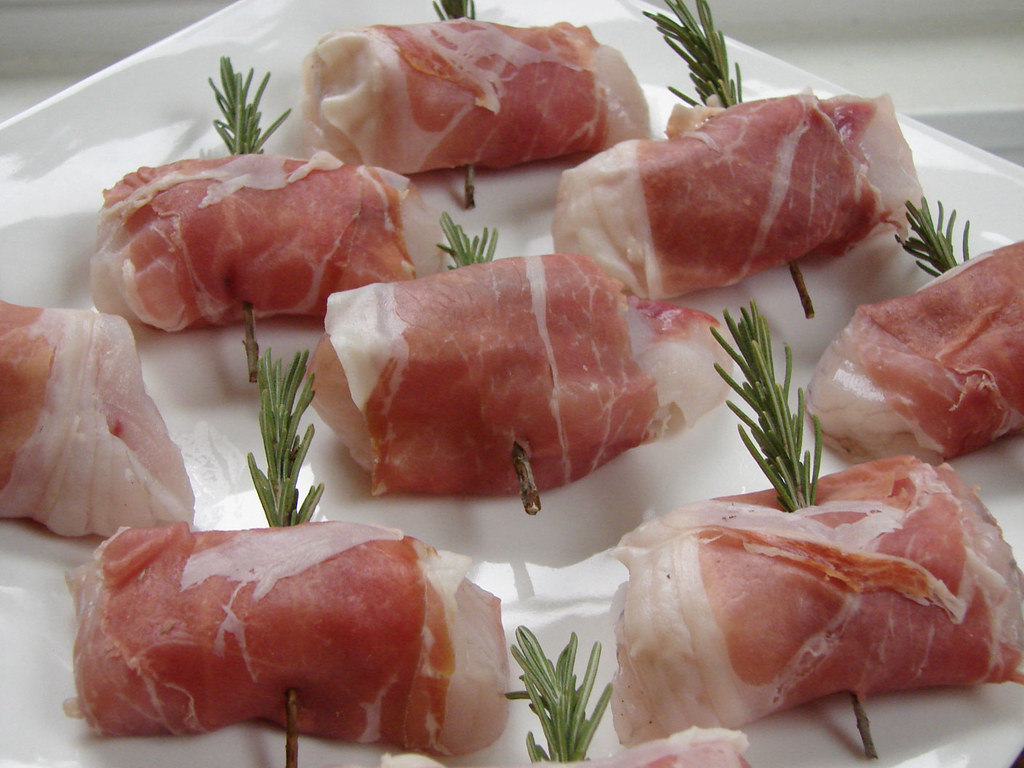 Monkfish appetizer Monkfish wrapped in prosciutto on a ros… Flickr
