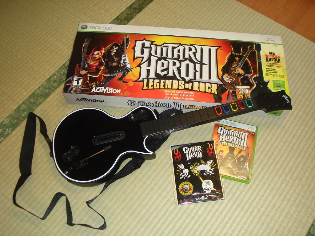 Guitar Hero 3 Xbox 360 Comes with a wireless guitar that… Flickr