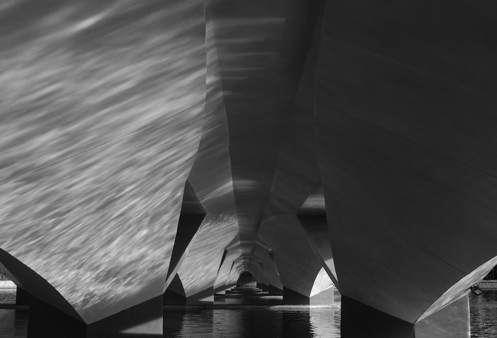 Reflections downunder Water reflections on concrete pillar… Flickr