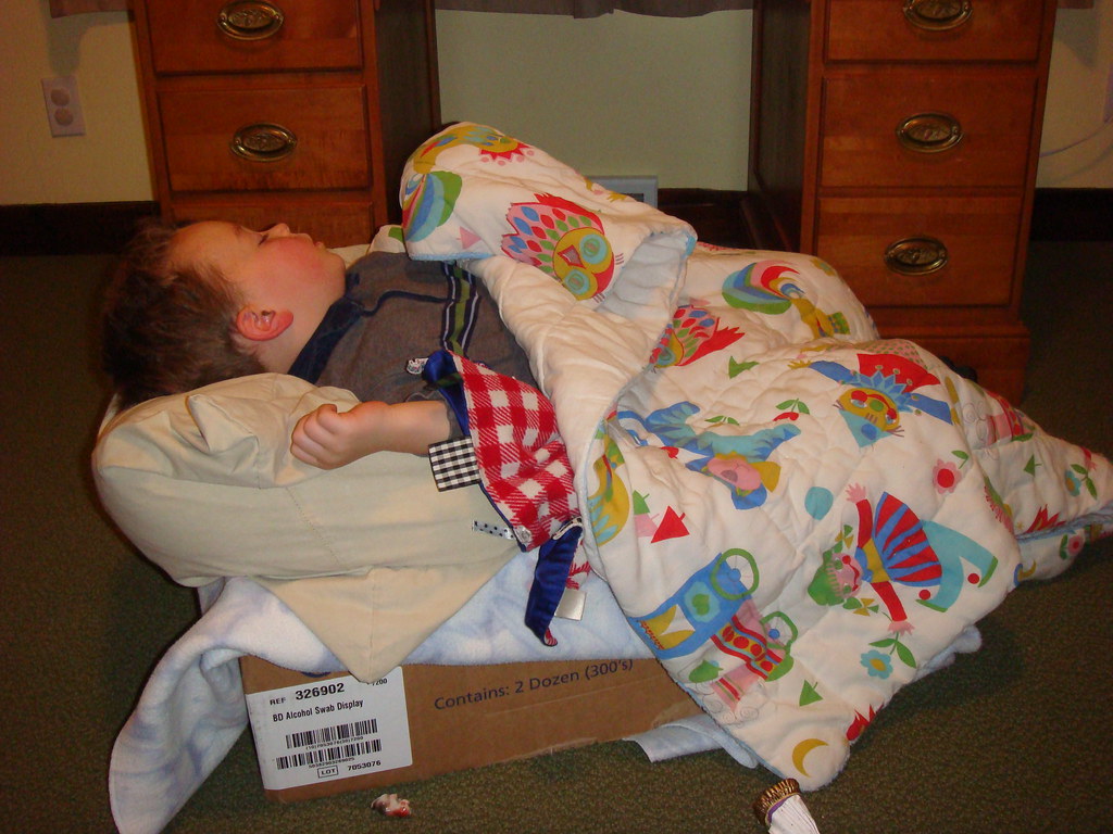 Boy sleeping in box sellke Flickr