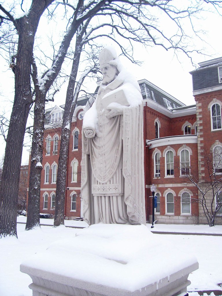 St. Ambrose in the snow statue of Saint Ambrose, of… Flickr