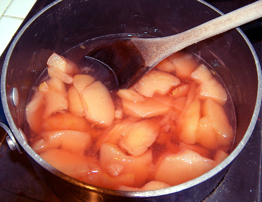 Stewed quince Simmered in a sugarandwater syrup with a l… Flickr