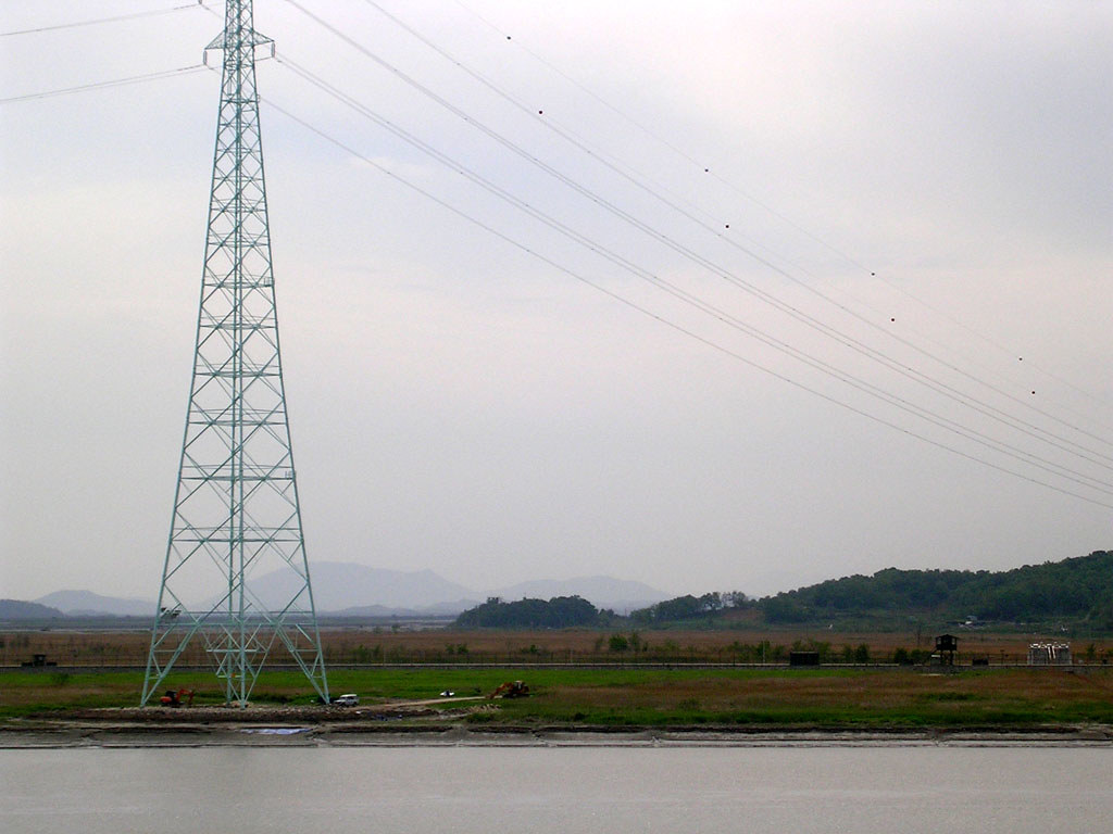 DSCN2528.jpg Power lines leading into North Korea. You'll … Flickr