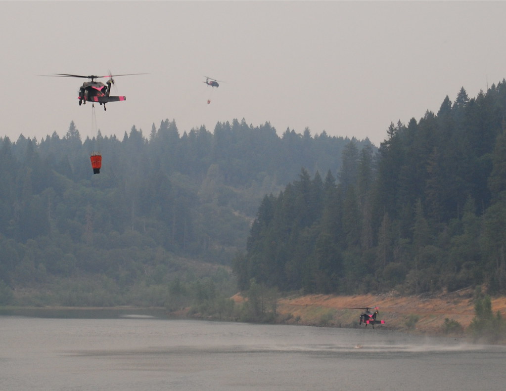 Three Helicopters picking up water out of Magalia Resivior… Flickr