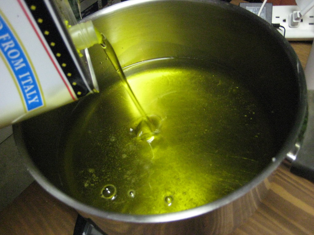 Olive Oil Adding olive oil to the melted hard oils.. getti… Flickr