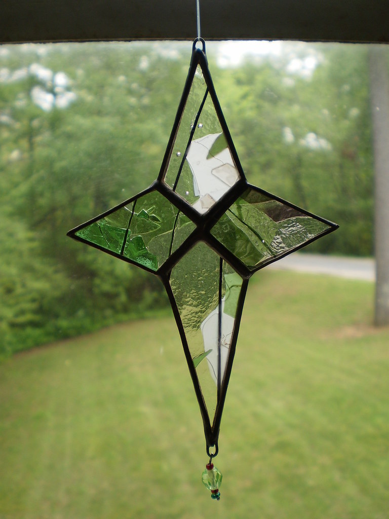 Stained Glass 4Pointed Star Small stained glass star with… Flickr