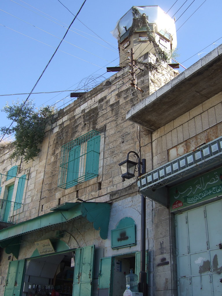 Hebron Downtown Hebron. An Israely military tower built on… Flickr