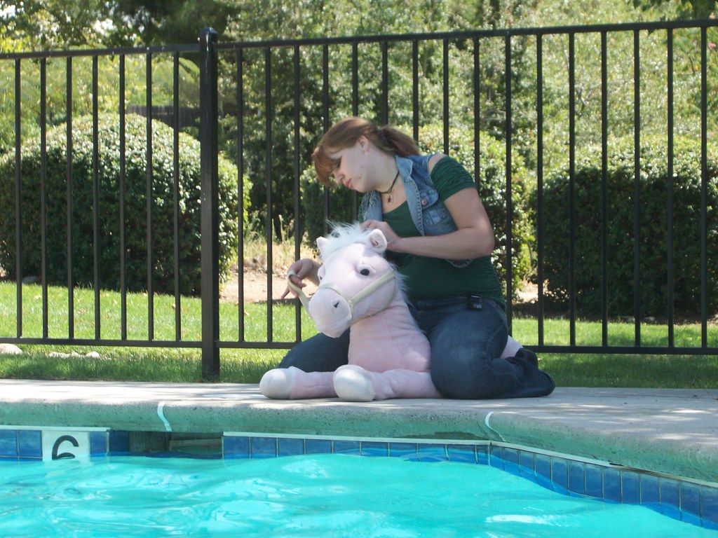 Riding the Cotton Pony Poor Lala can't go swimming cuz she… Flickr