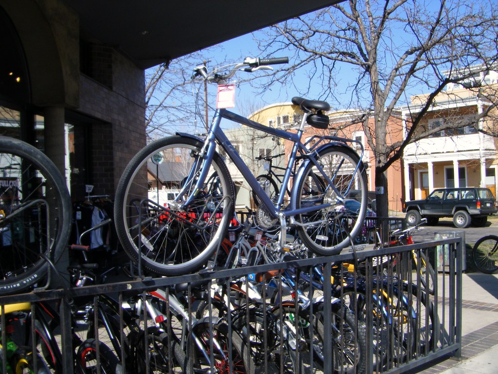 a bike store and bikes on a rail Bradley Gordon Flickr
