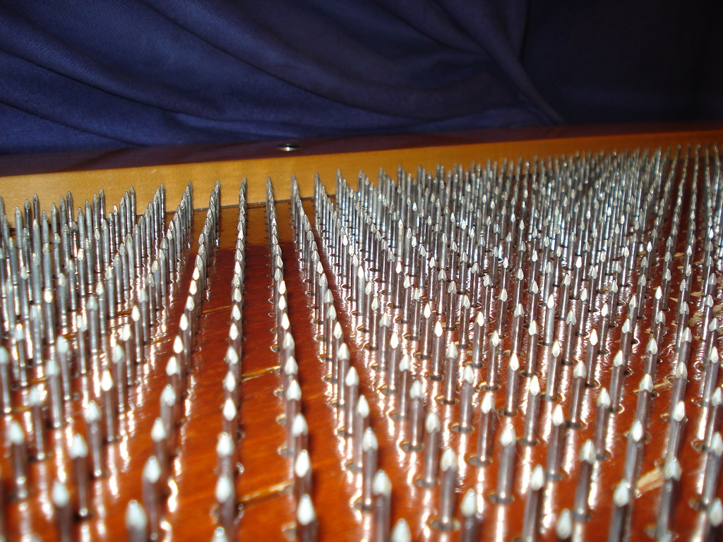 Bed of Nails A fakir's bed of nails. You lie down on it an… Flickr
