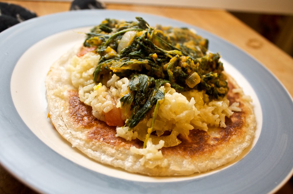 pumpkin saag and saffron/garlic rice on roti penguincakes Flickr