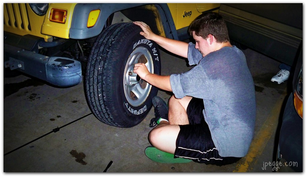 Tire jockey Now he knows how and I feel way better knowing… Flickr